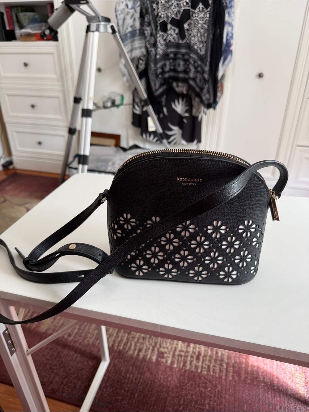 Kate Spade perforated small bag 9 x 7”black logo.  NWOT